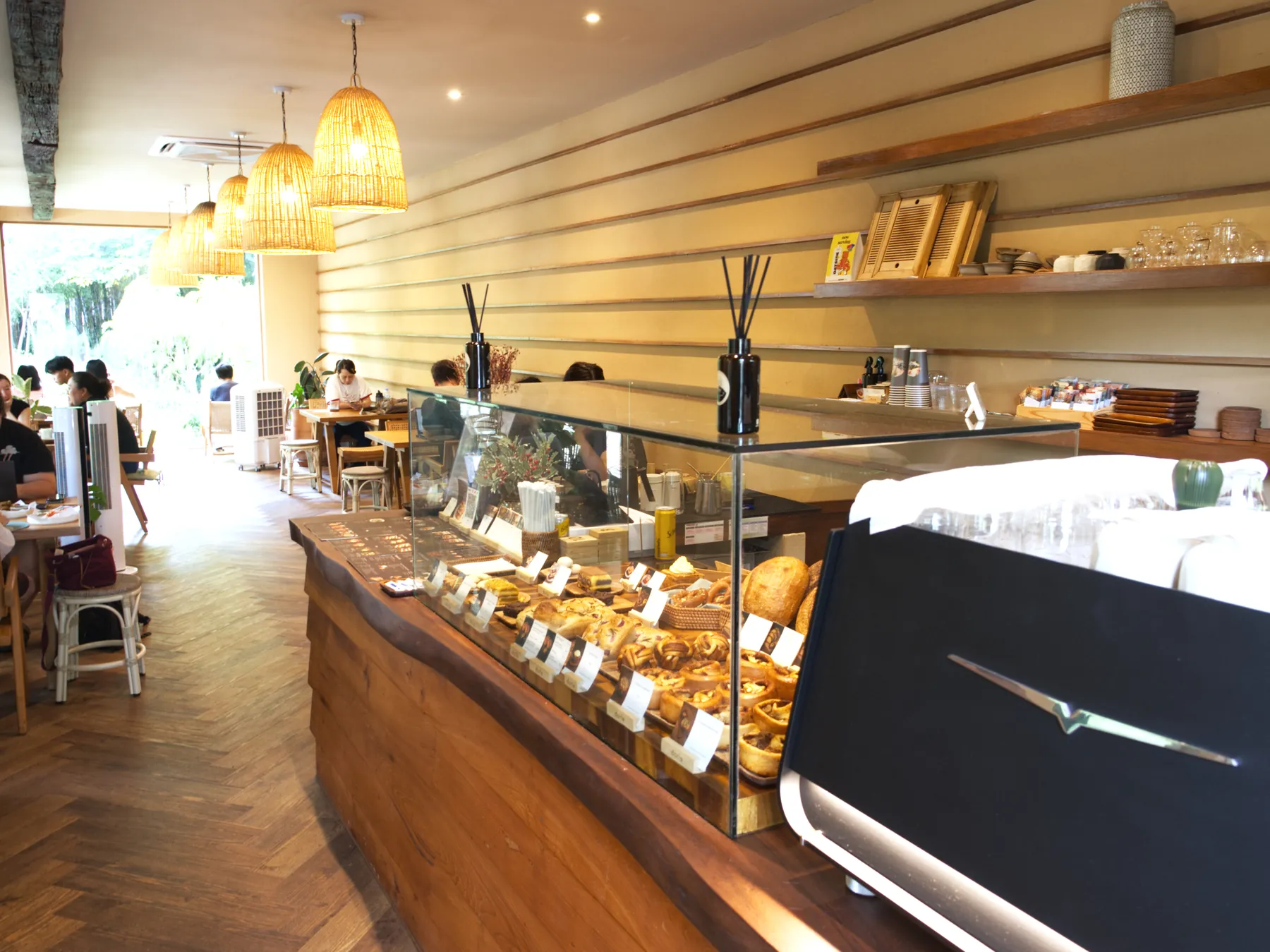 Warm wooden café counter and seating inside Dorle